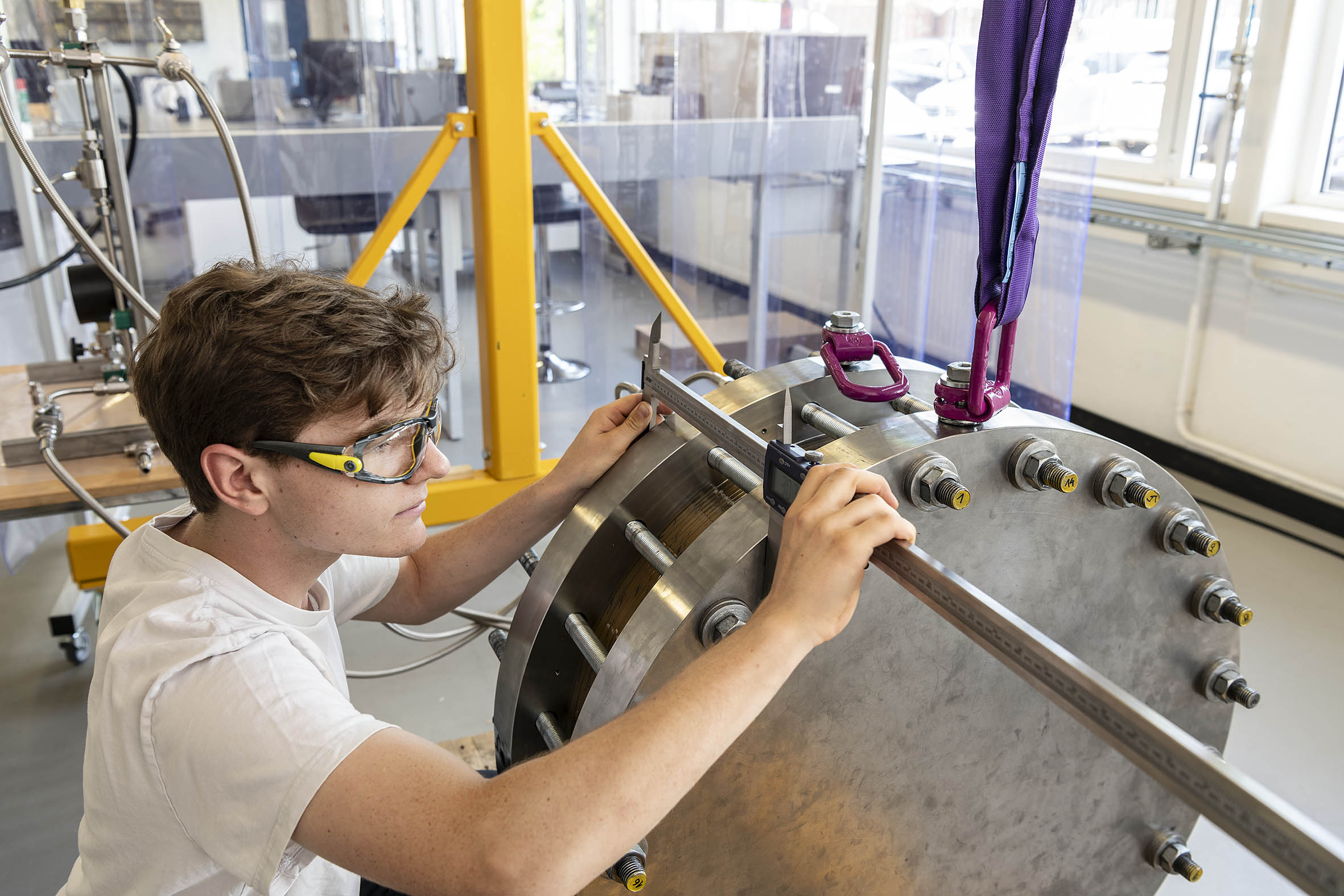 An Exion employee working on an Exion Hydrogen unit